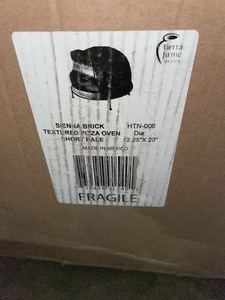lot 17 image: 22 IN. CLAY BRICK STYLE ROUND SMOOTH WOOD BURNING OUTDOOR PIZZA OVEN IN YELLOW. SEE PICTURES