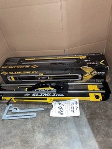 lot 25 image: QEP 24 IN. PROFESSIONAL SLIMLINE TILE CUTTER. SEE PICTURES