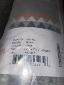 lot 81 image: WELL WOVEN MYSTIC NOVA MODERN GEOMETRIC GREY 5 FT. 3 IN. X 7 FT. 3 IN. AREA RUG. SEE PICTURES