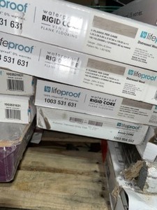 lot 88 image: ASSORTED LIFE PROOF VINYL PLANK FLOORING. VARIOUS COLORS AND CONDITIONS. SEE PICTURES