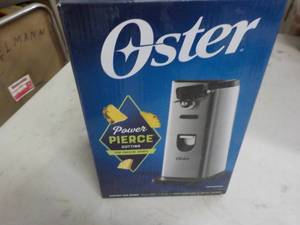 lot 25 image: Oster electric can opener...