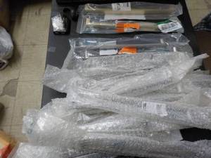 lot 33 image: 21 drawer pulls - 12 long, 19 brus...
