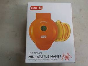 lot 41 image: Dash mini waffle maker...