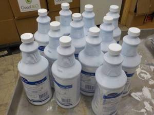 lot 105 image: 12 Quart bottles Diversey Disinfect...