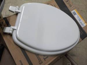 lot 131 image: elongated toilet seat...
