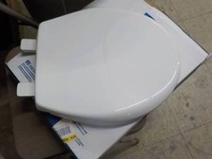 lot 133 image: Bemis round toilet seat...