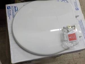 lot 134 image: Bemis round toilet seat...