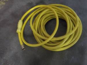 lot 154 image: garden hose and nozzle...