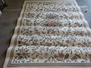 lot 172 image: area rug 63x94 needs cleaning...