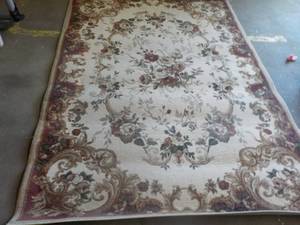 lot 173 image: area rug 63x94 needs cleaning...