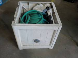 lot 179 image: garden hose and hose reel...