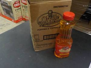 lot 205 image: 6 -16 oz Bottles Orville Redenbache...