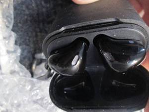 lot 28 image: Bluetooth Airbuds with Charger out ...