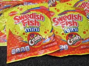 lot 54 image: 12- 3.6 oz Bags of Swedish Fish Min...