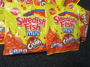 lot 59 image: 12- 3.6 oz Bags of Swedish Fish Min...