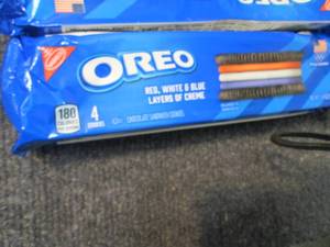 lot 67 image: 12- 2.54 oz Pks Oreos w Red, White...