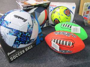 lot 217 image: 2 Soccer Balls, 2 Footballs, Volley...