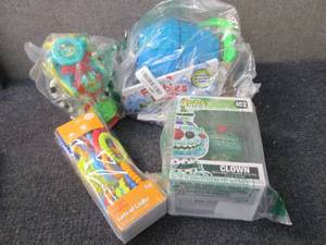 lot 257 image: 4 Assorted Toys...