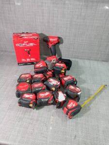 lot 35 image: M18 FUEL 18-Volt Lithium-Ion Brushless Cordless 38 in. Compact Impact Wrench with Friction Ring (Tool-Only) & tape measures - mixed conditions