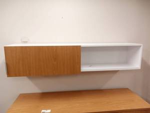 lot 16 image: 72 White Wall Cabinet with Sliding Wood Door