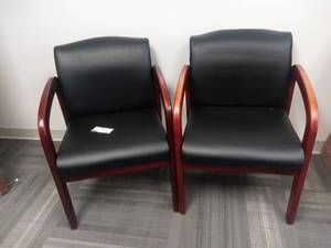 lot 24 image: 2 22 x 20 x 33 Black Leather and Wood Executive Office Chairs