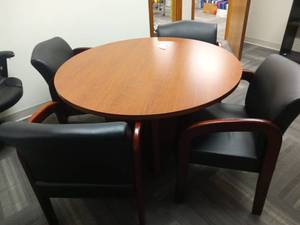 lot 31 image: 42 Wood Veneer Round Table and 4 Wood and Leather Chairs