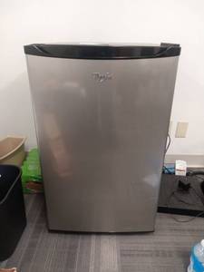 lot 21 image: 35 Whirlpool Stainless Steel 4.3 Cu Ft. Freestanding Refrigerator