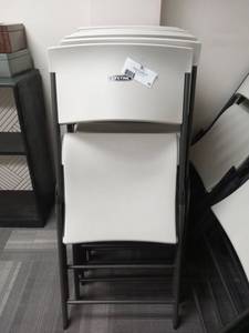 lot 55 image: Lifetime Folding Chairs Set