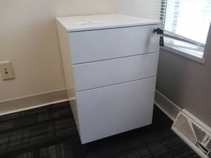lot 7 image: 24 Modern White File Cabinet WKey