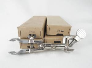 lot 265 image: Set of 4 Mercer Glass Works Neverust Burette Clamps - Made in Japan