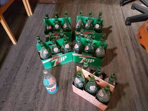lot 72 image: 30 7 Up Bottles, 1 RC Bottle
