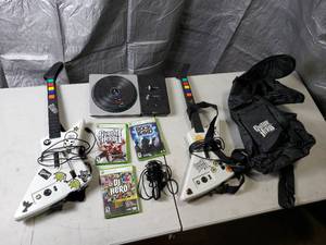 lot 84 image: XBox 360 Rock Band Guitar Hero DJ Hero Games, Guitars