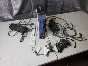 lot 86 image: White XBox 360 and Controllers