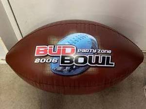 lot 36 image: 2006 Bud Bowl Inflatable Football Approximately 32 Long