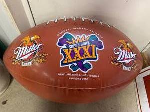 lot 40 image: 1996 Miller Beer Inflatable Football Approximately 33 Long