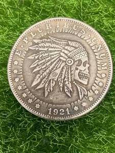 lot 95 image: Unique Skull Morgan Dollar Coin