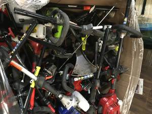Gaylord full of assorted outdoor tools used some for parts or repair see pictures