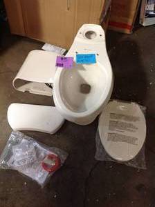 lot 16 image: Glacier Bay 2-piece 1.28 GPF High Efficiency Single Flush Elongated Toilet in Biscuit see pictures