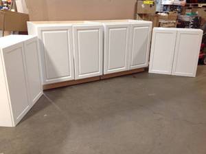 lot 31 image: Lot of assorted cabinets white see some damaged pictures