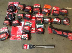 lot 45 image: Lot of assorted milwaukee tape measures various sizes and conditions