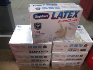 lot 78 image: 7 Boxes of Latex Exam Gloves One Si...