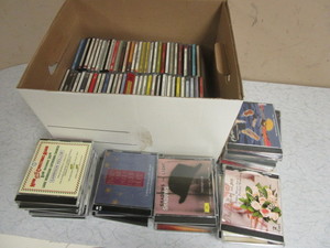 lot 834 image: BOX OF COMPACT DISCS, CLASSICAL, POP, OPERA, COUNTRY, HOLIDAY, BIG BAND, GARRISON KEILLOR, MORE
