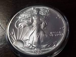 1989 AMERICAN SILVER EAGLE 1 TROY OZ. .999 FINE SILVER IN AIRTITE
