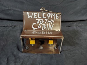 lot 54 image: New Recycled Metal Welcome to the Cabin Birdhouse with Hanging Hook