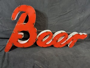 lot 59 image: New Recycled Metal Garden Art Beer Sign