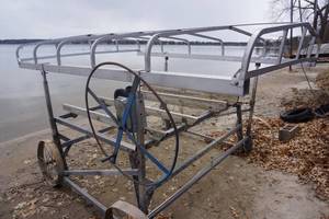 lot 2 image: 2 Unit Jet Ski Boat Lift With Canvas CanopyTarp Can Be Reconfigured For Larger Single Unit Machine