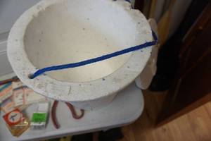 lot 62 image: Vintage Fish HoldersHook Removers With Styrofoam Minnow Bucket and Assorted New Eagle Claw Hooks