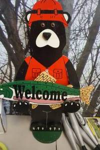 lot 72 image: Gone FishingWelcome Bear & Fish Yard Sign