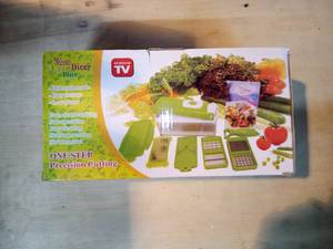 lot 14 image: Genius Multischneider Nicer Dicer Plus in Kiwi