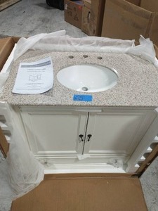 lot 65 image: HOME DECORATORS Newport 37 in. W x 21-12 in. D Bath Vanity in Ivory with Granite Vanity Top in Champagne